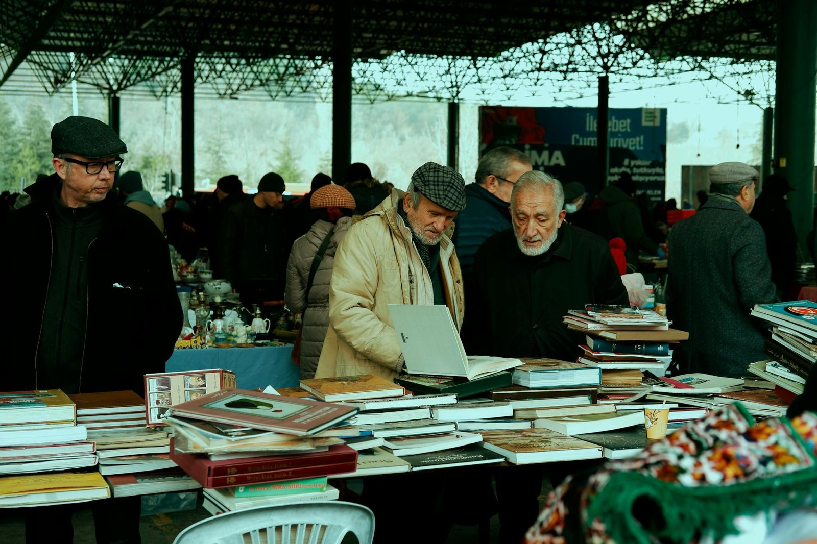 a crowd on a flea market