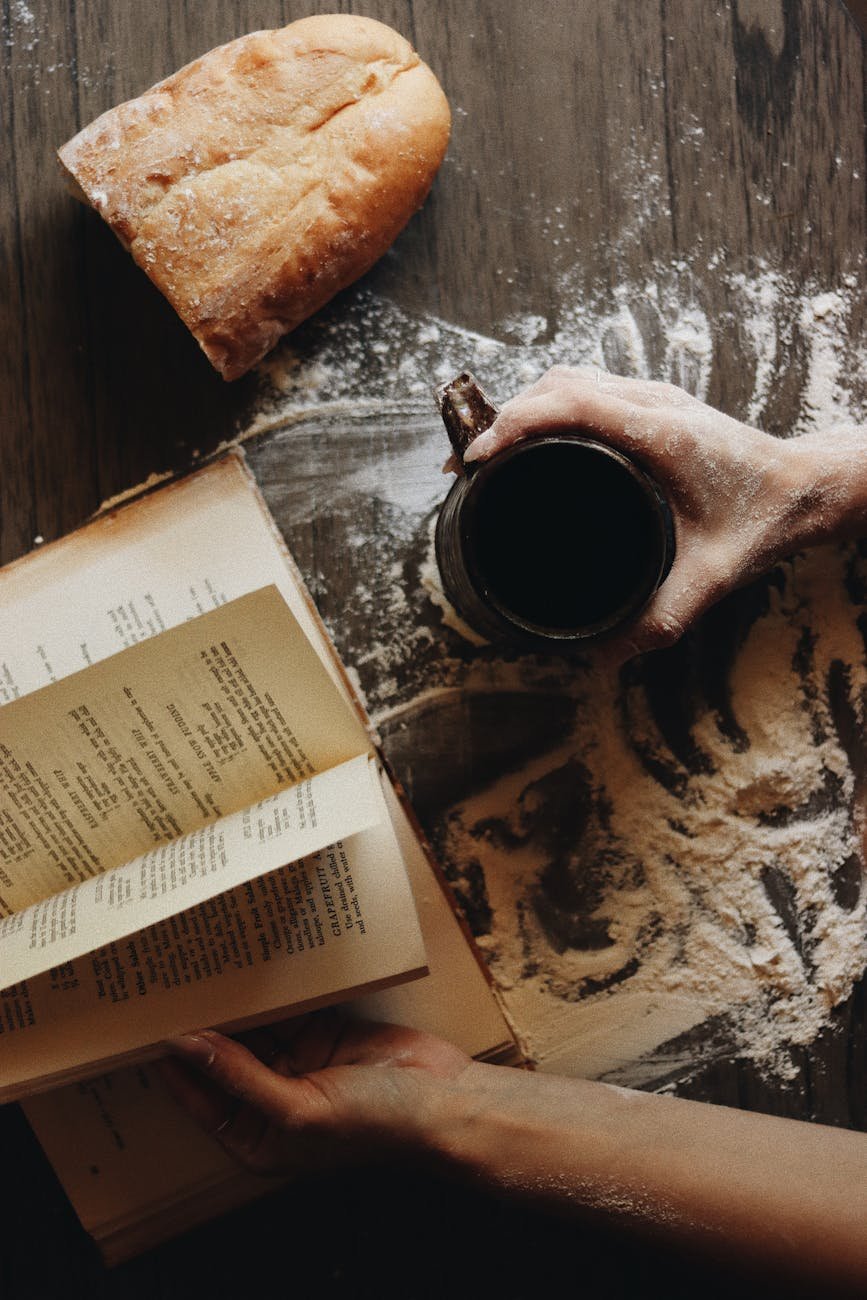 pexels-photo-29666875 - THE SHOP rustic baking scene with coffee and recipe book