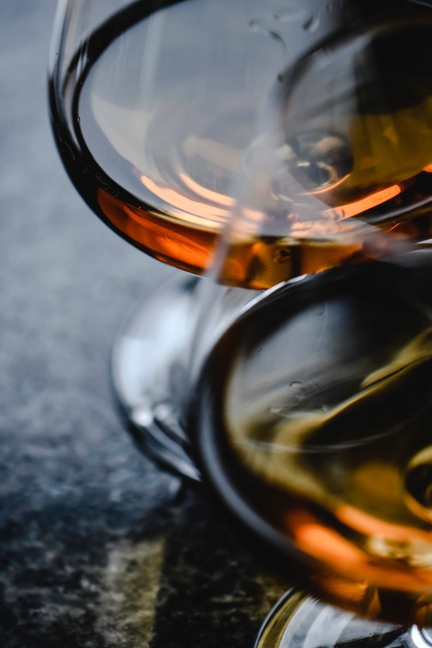 close up photo of whiskey in glasses
