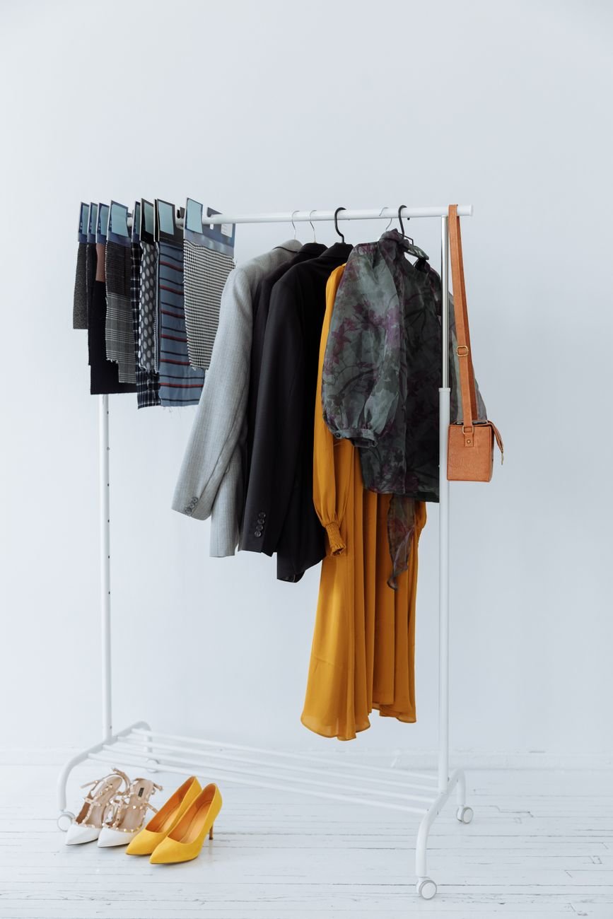 clothes hanging on a clothes rack